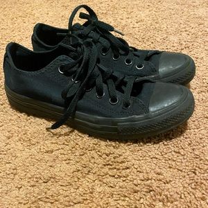 All black Converse Chuck Taylor Low tops
